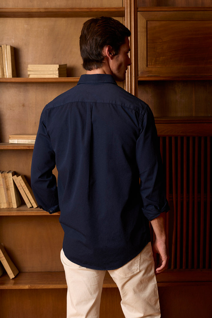 Navy-blue cotton twill shirt with worn button-down buttons