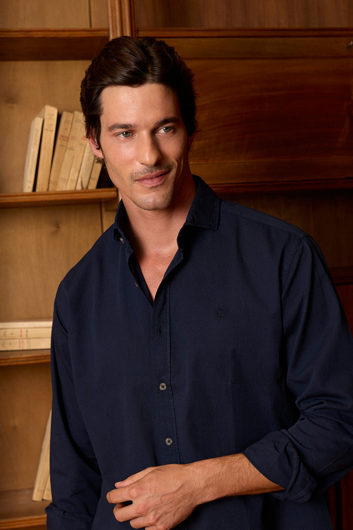 Navy-blue cotton twill shirt with worn button-down buttons