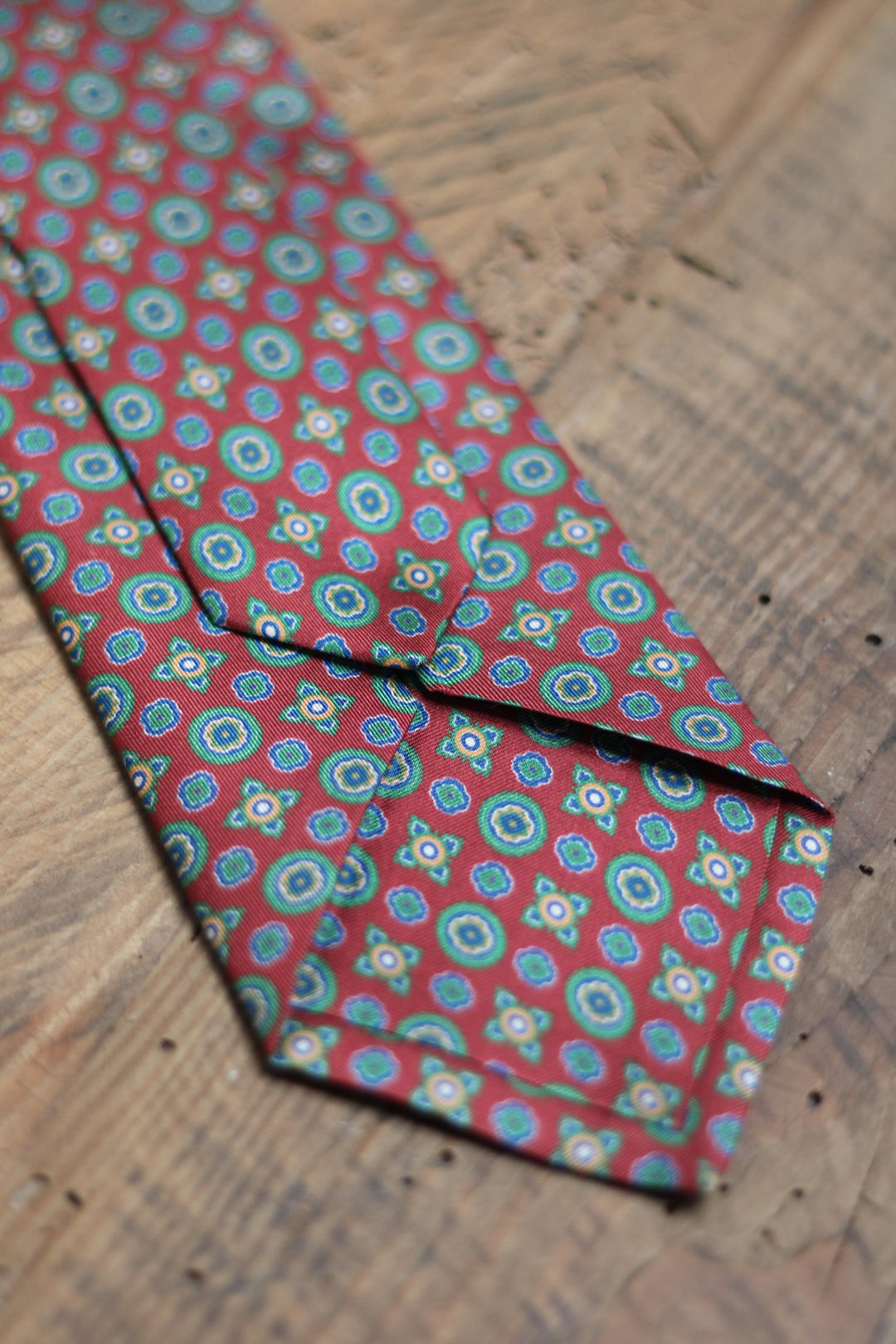 Burgundy Silk Seven-Fold Tie Small Shapes in Blue, White and Yellow 