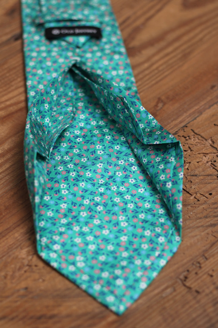 Turquoise Blue Silk Seven-Fold Tie with Möbius Floral Design 