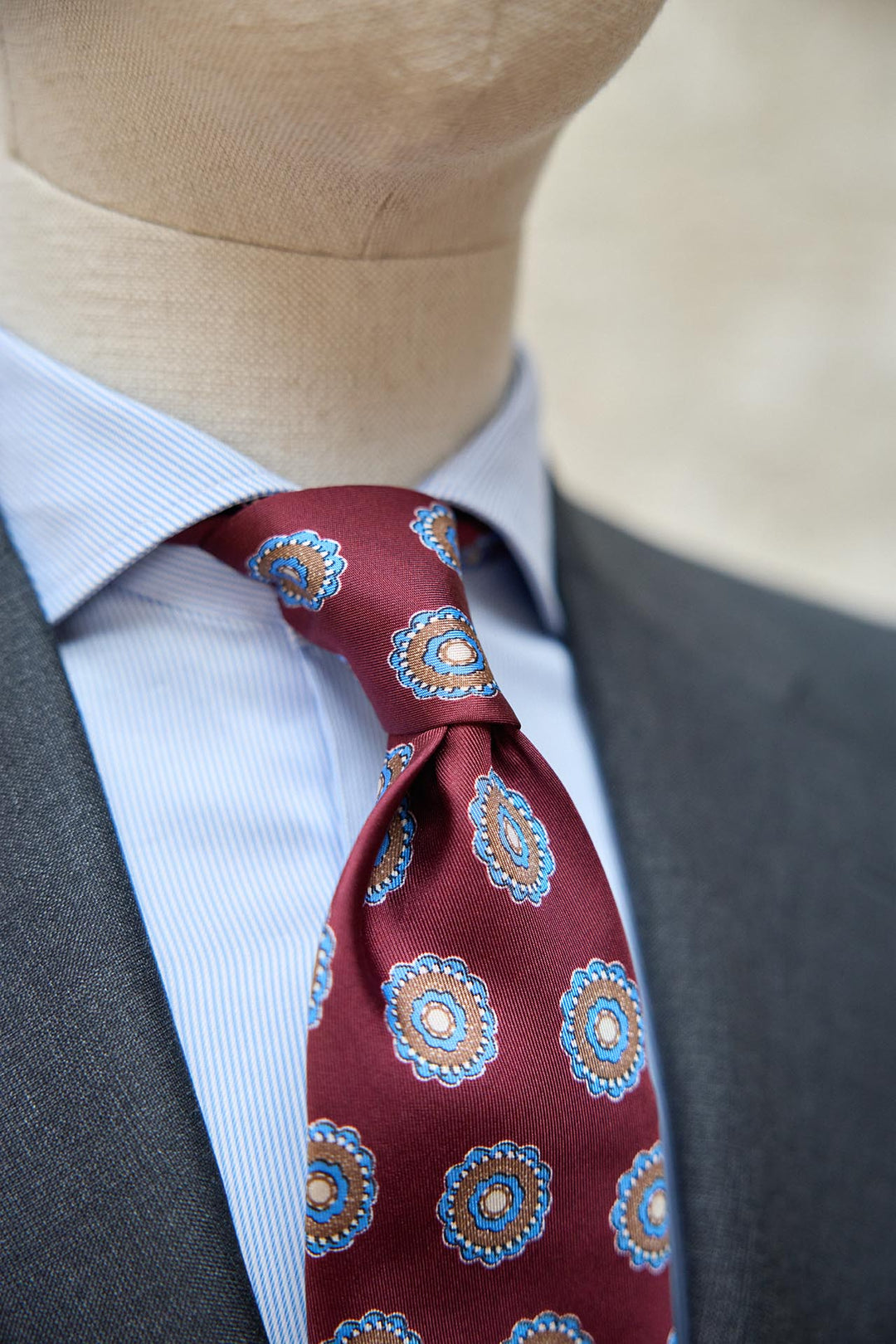 Napoli Silk Tie Burgundy Concentric Rosette Sky Blue and Ochre