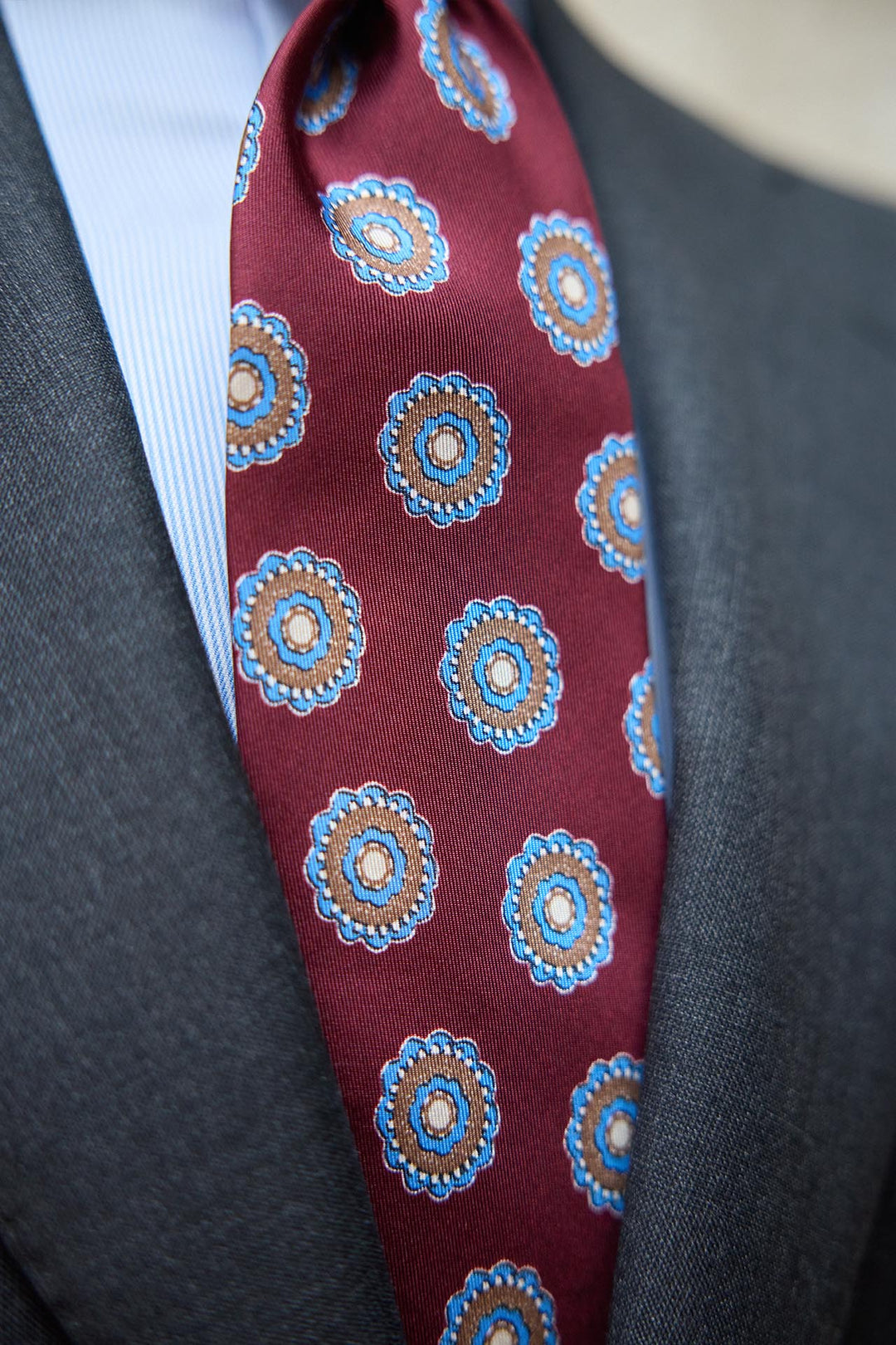 Napoli Silk Tie Burgundy Concentric Rosette Sky Blue and Ochre