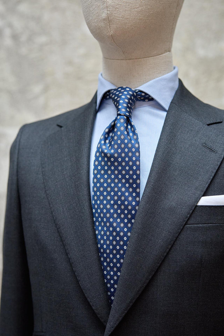 Napoli Blue Silk Tie With daisies in grayish blue and white tones