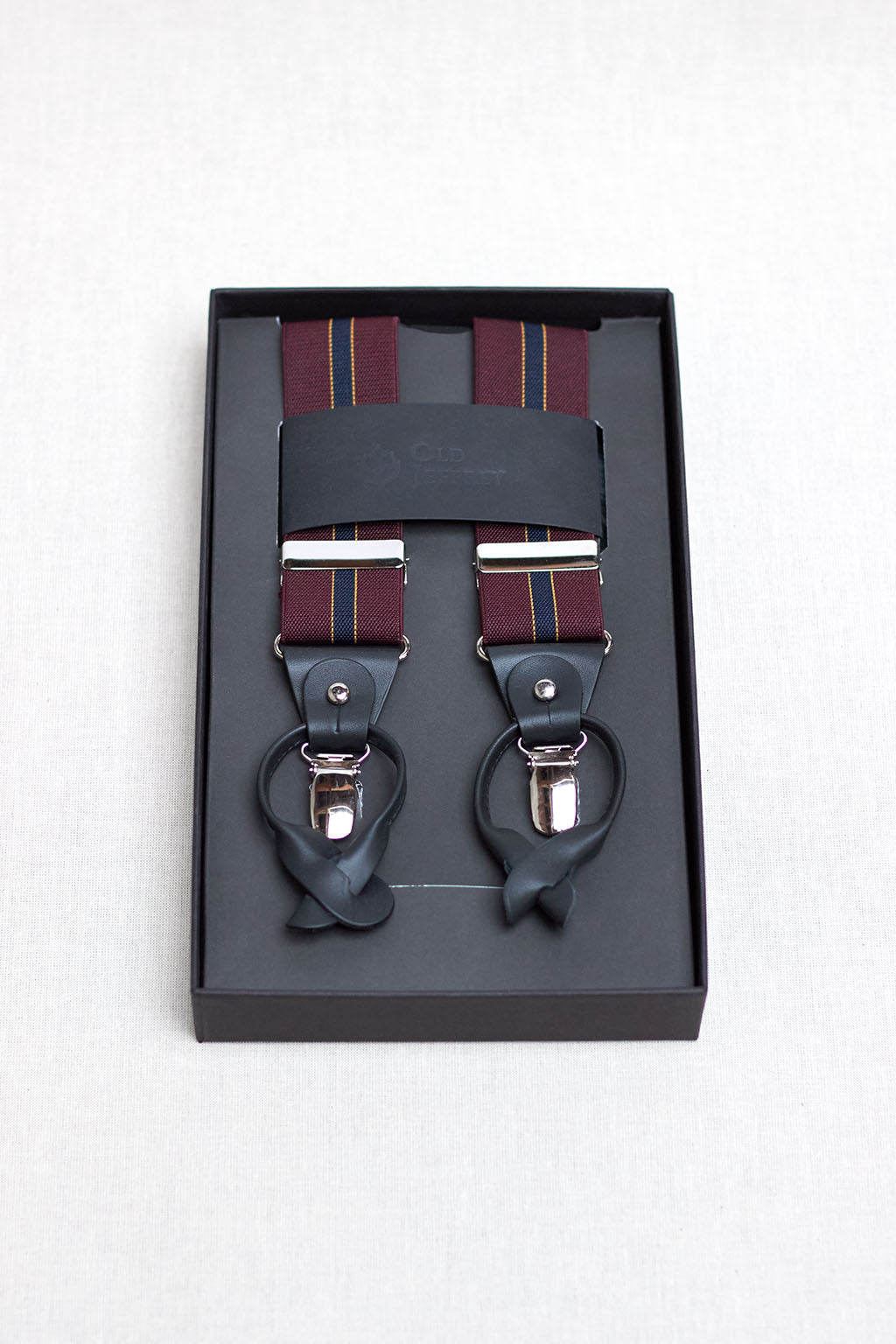 Burgundy Suspenders with Vertical Blue Stripe Outlined in Yellow and Brown Leather Handles