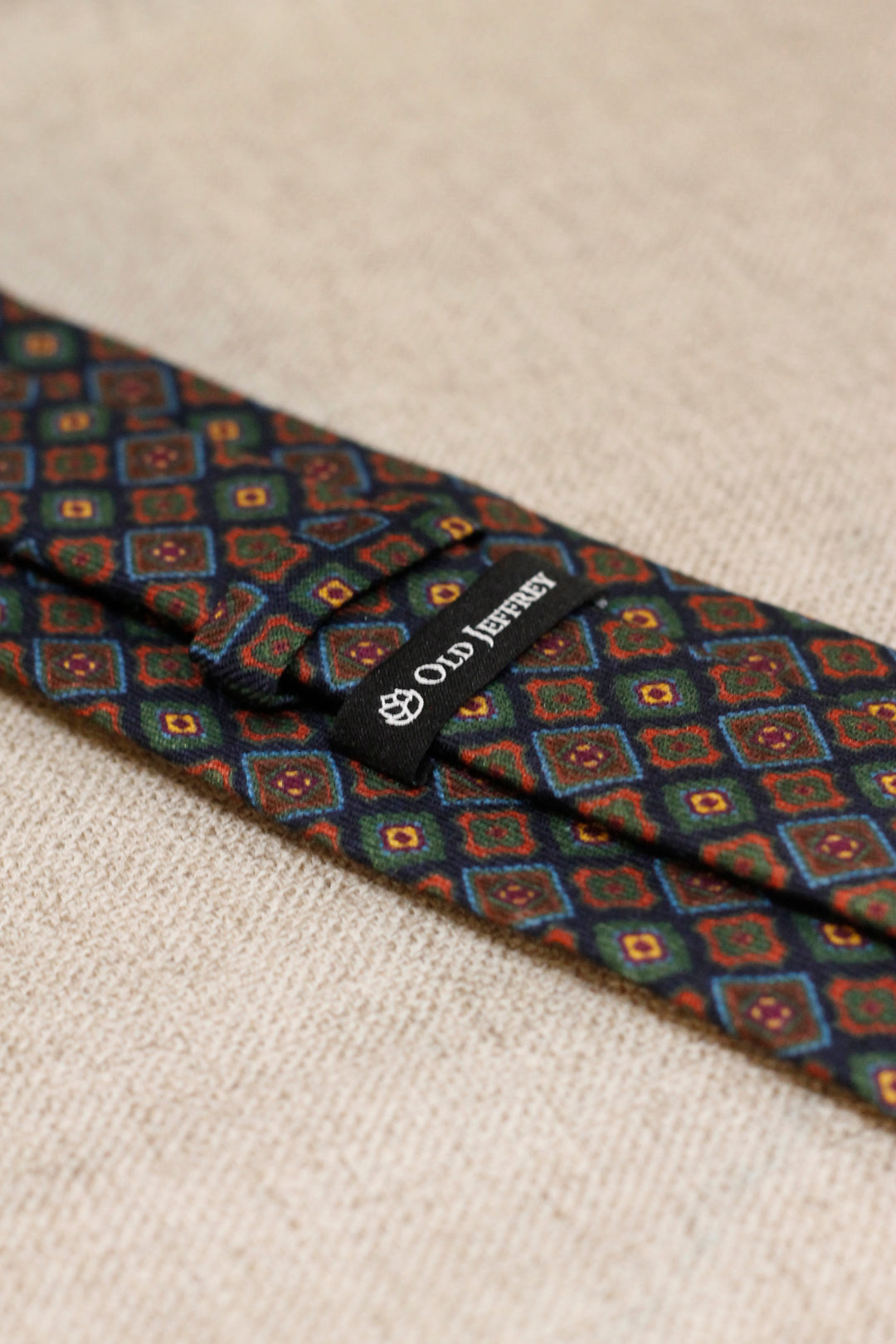 Napoli WOOL Tie Navy Background Mixed Geometry Green and Tile