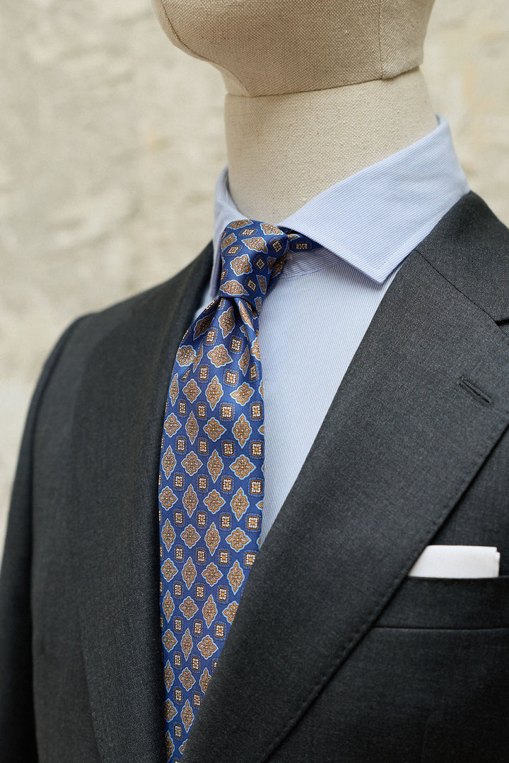 Corbata Napoli Seda Azul Geometría Floral Naranja y Ocre